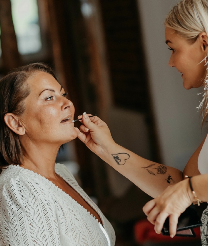 Lucy Applying Makeup to mother of the bride